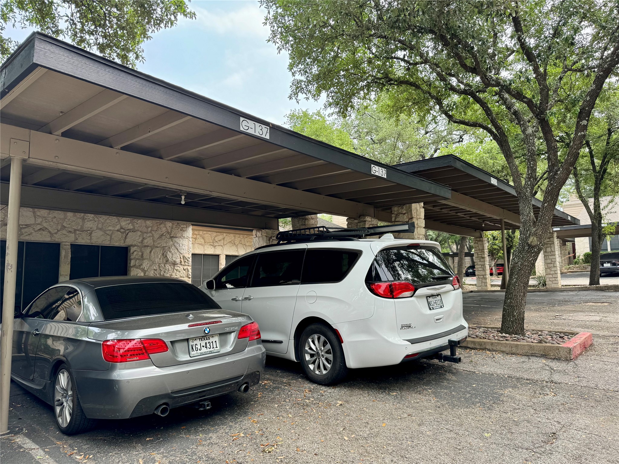 3809 Spicewood Springs Road, Unit 137 Austin, TX 78759 - Photo 33 of 34 a car parked in garage