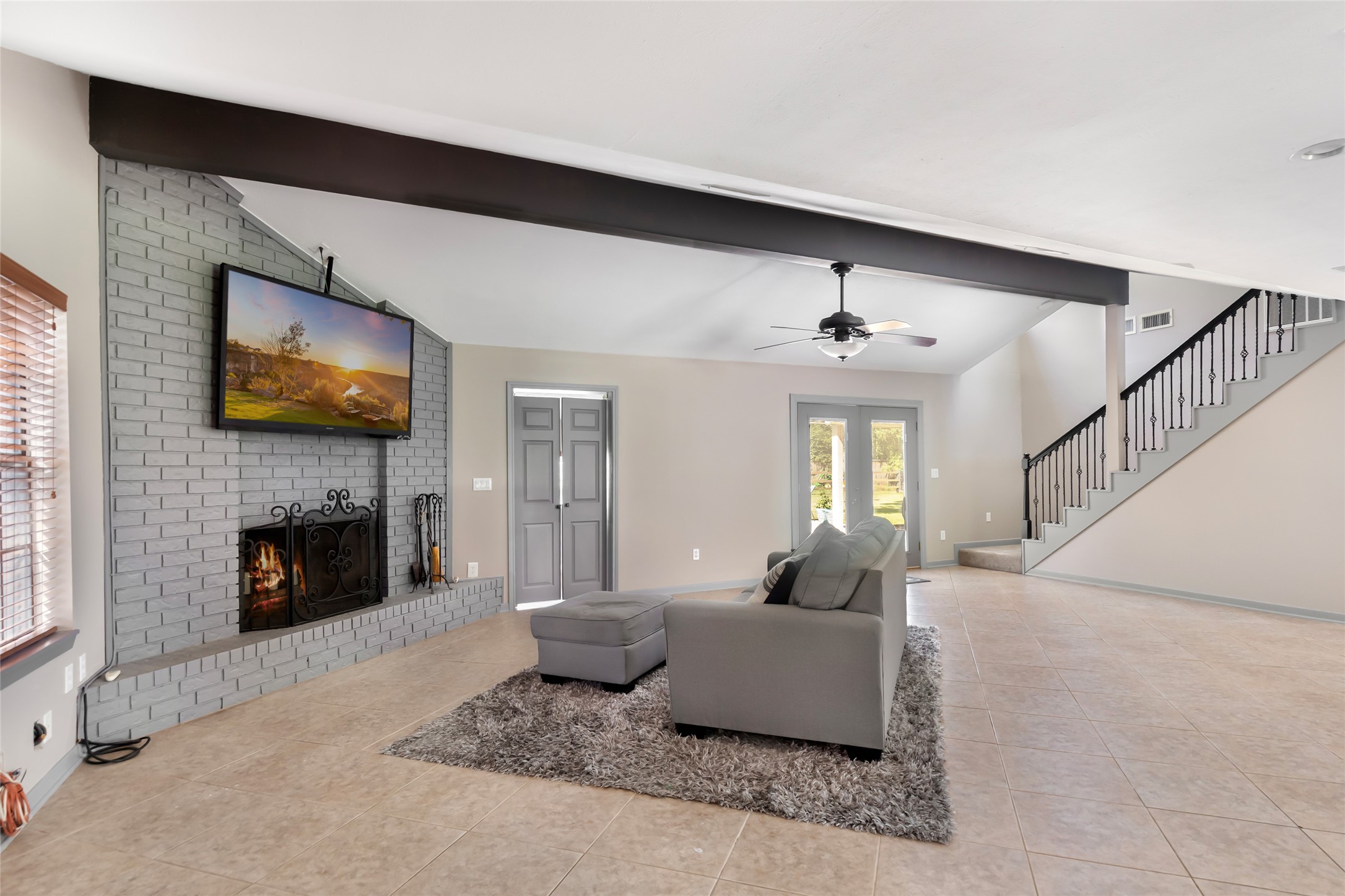 1300 Smith Road Huffman, TX 77336 - Photo 24 of 50 Cozy wood-burning fireplace for warmth and ambiance.