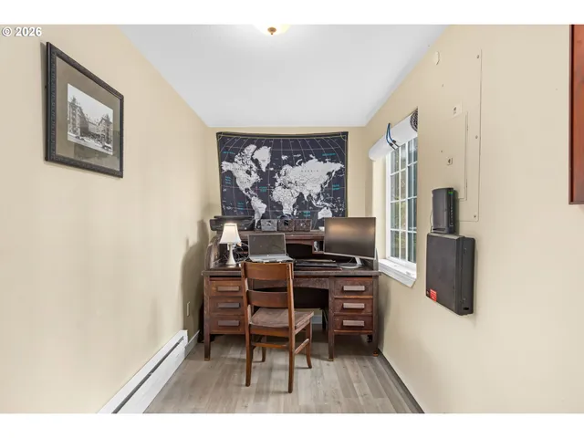 a workspace with furniture and window