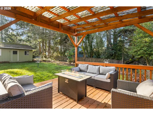 a view of swimming pool with outdoor seating