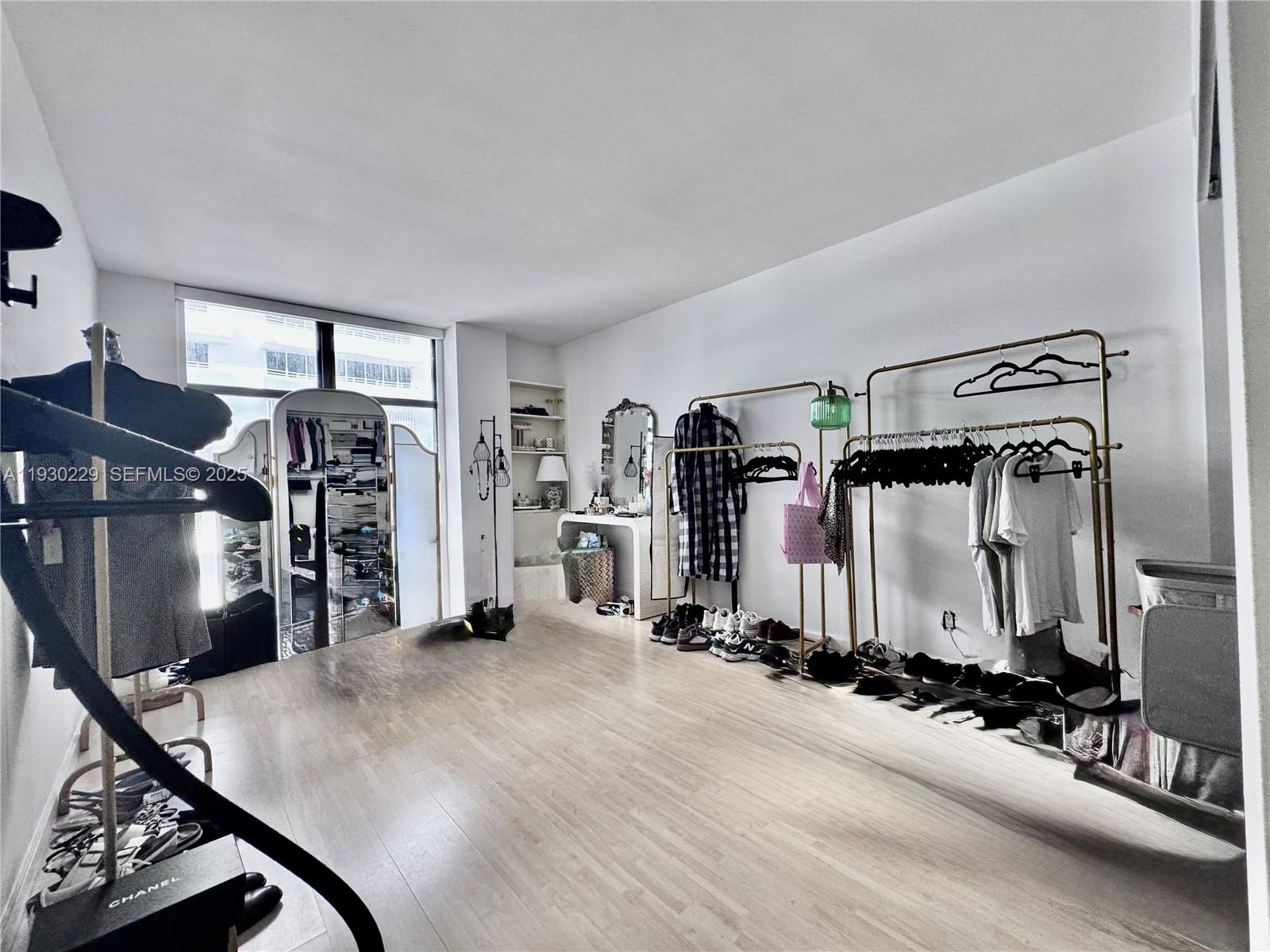 8877 Collins Avenue, Unit 402 Surfside, FL 33154 - Photo 14 of 24 a view of a room with gym equipment