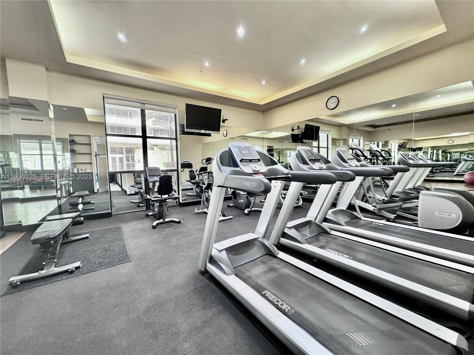8877 Collins Avenue, Unit 402 Surfside, FL 33154 - Photo 24 of 24 a view of a room with gym equipment