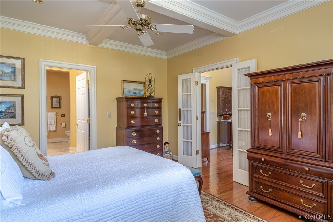 102 Par Drive Williamsburg, VA 23188 - Photo 22 of 42 a bedroom with a bed and wooden floor