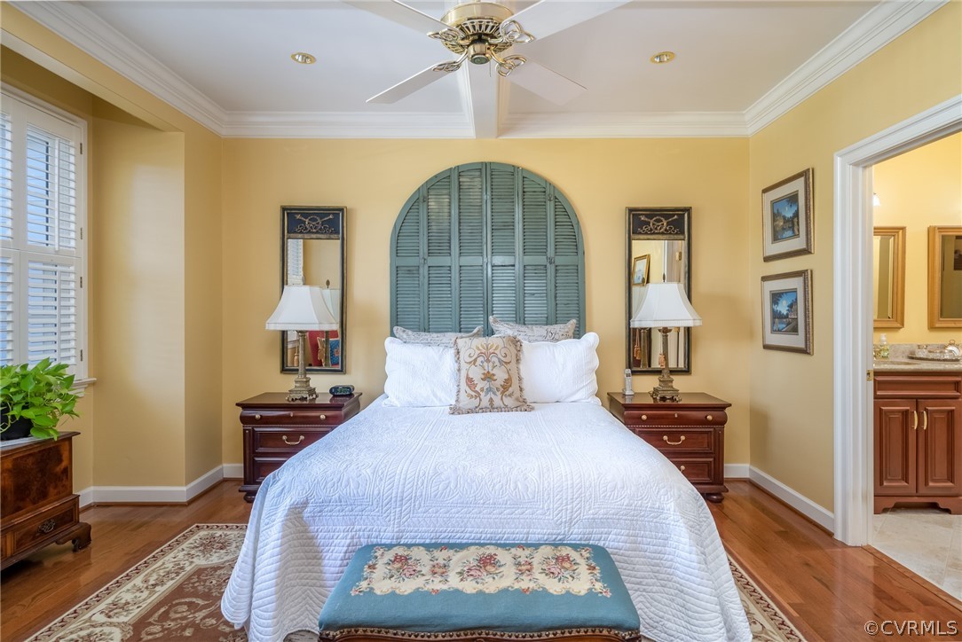 102 Par Drive Williamsburg, VA 23188 - Photo 23 of 42 a bed sitting in a bedroom next to a window