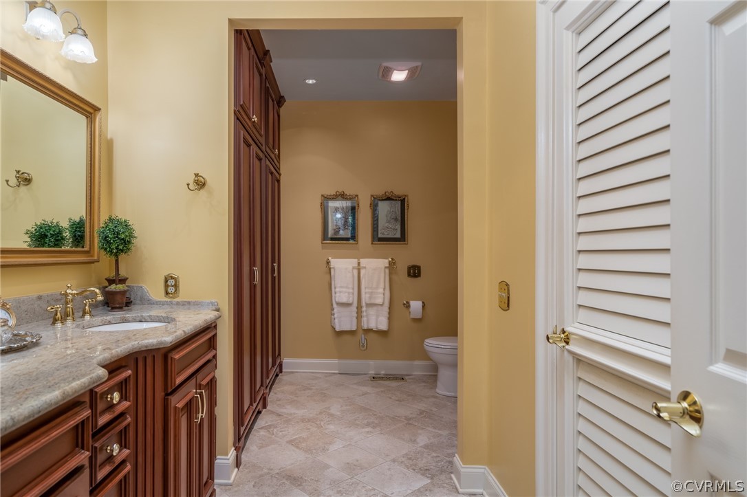 102 Par Drive Williamsburg, VA 23188 - Photo 25 of 42 a bathroom with a sink and a mirror