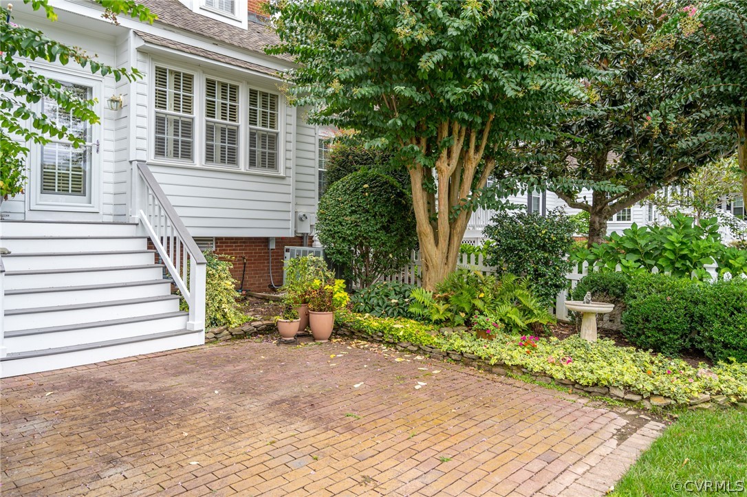 102 Par Drive Williamsburg, VA 23188 - Photo 40 of 42 a view of a house with potted plants and a large tree