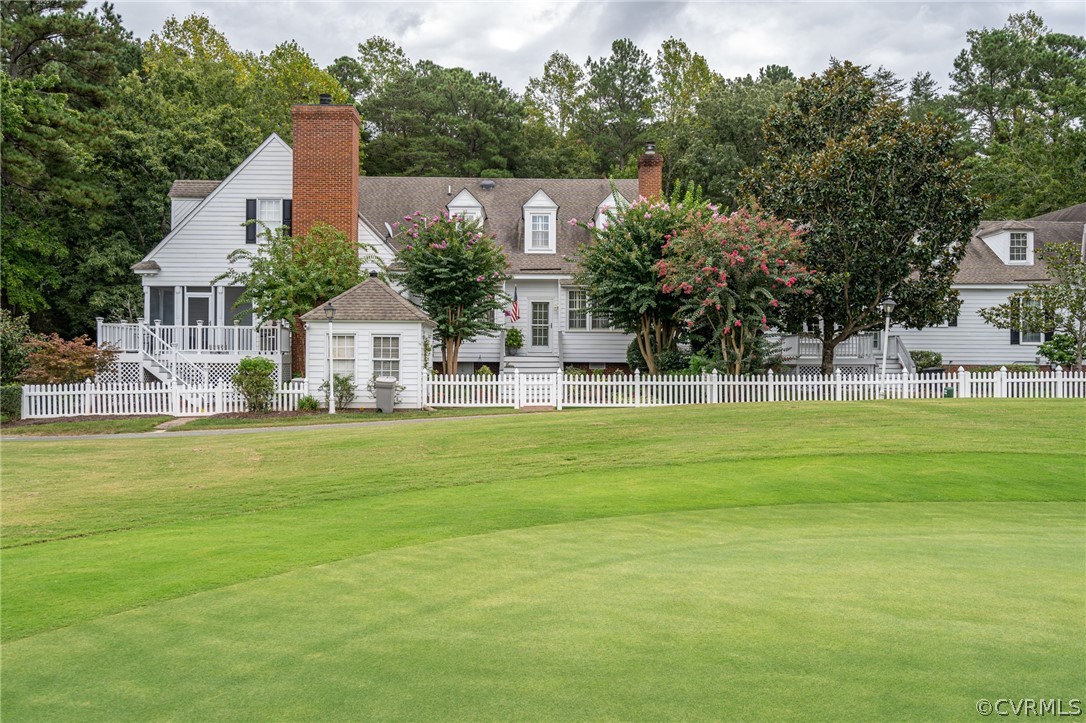 102 Par Drive Williamsburg, VA 23188 - Photo 41 of 42 a front view of a house with a garden
