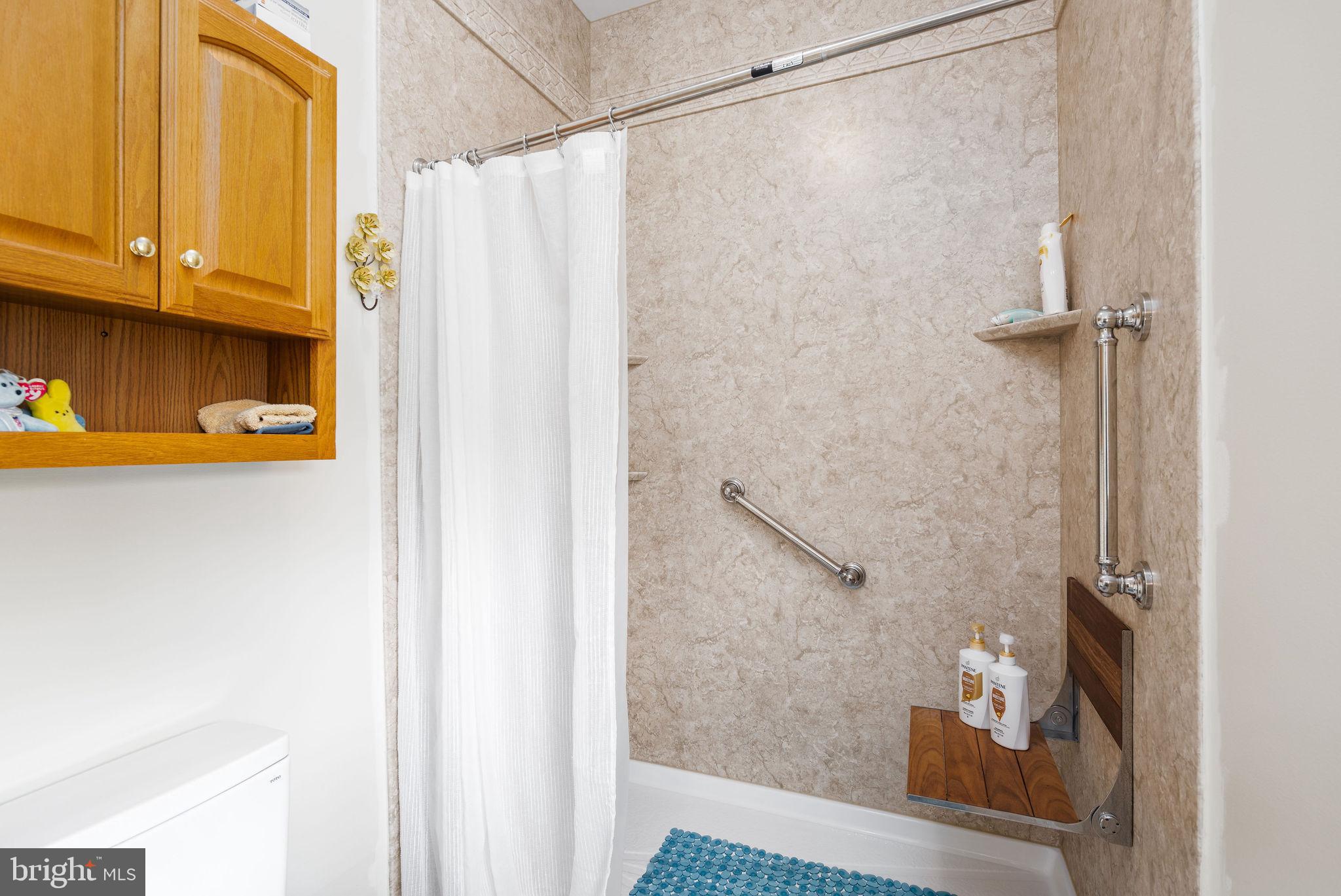 10 Arrowood Knobs Lewes, DE 19958 - Photo 16 of 40 a bathroom with a shower