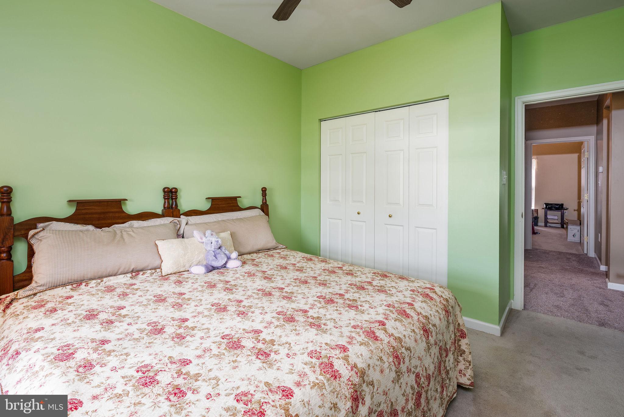 10 Arrowood Knobs Lewes, DE 19958 - Photo 18 of 40 a bedroom with a bed and closet