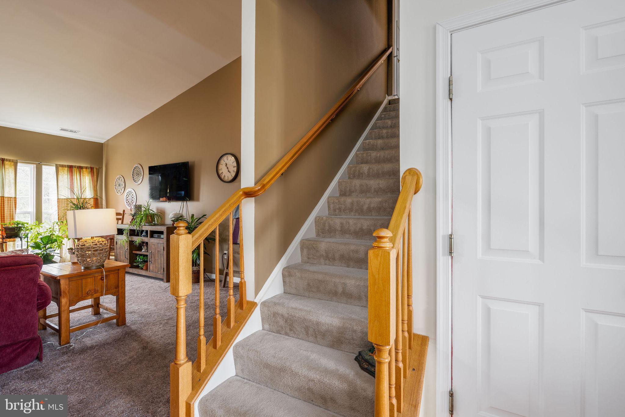10 Arrowood Knobs Lewes, DE 19958 - Photo 23 of 40 a view of entryway and hall with wooden floor