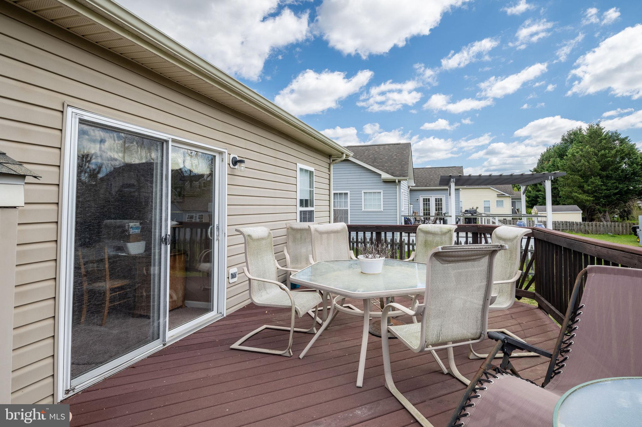 10 Arrowood Knobs Lewes, DE 19958 - Photo 28 of 40 a view of a dining room with furniture and wooden floor