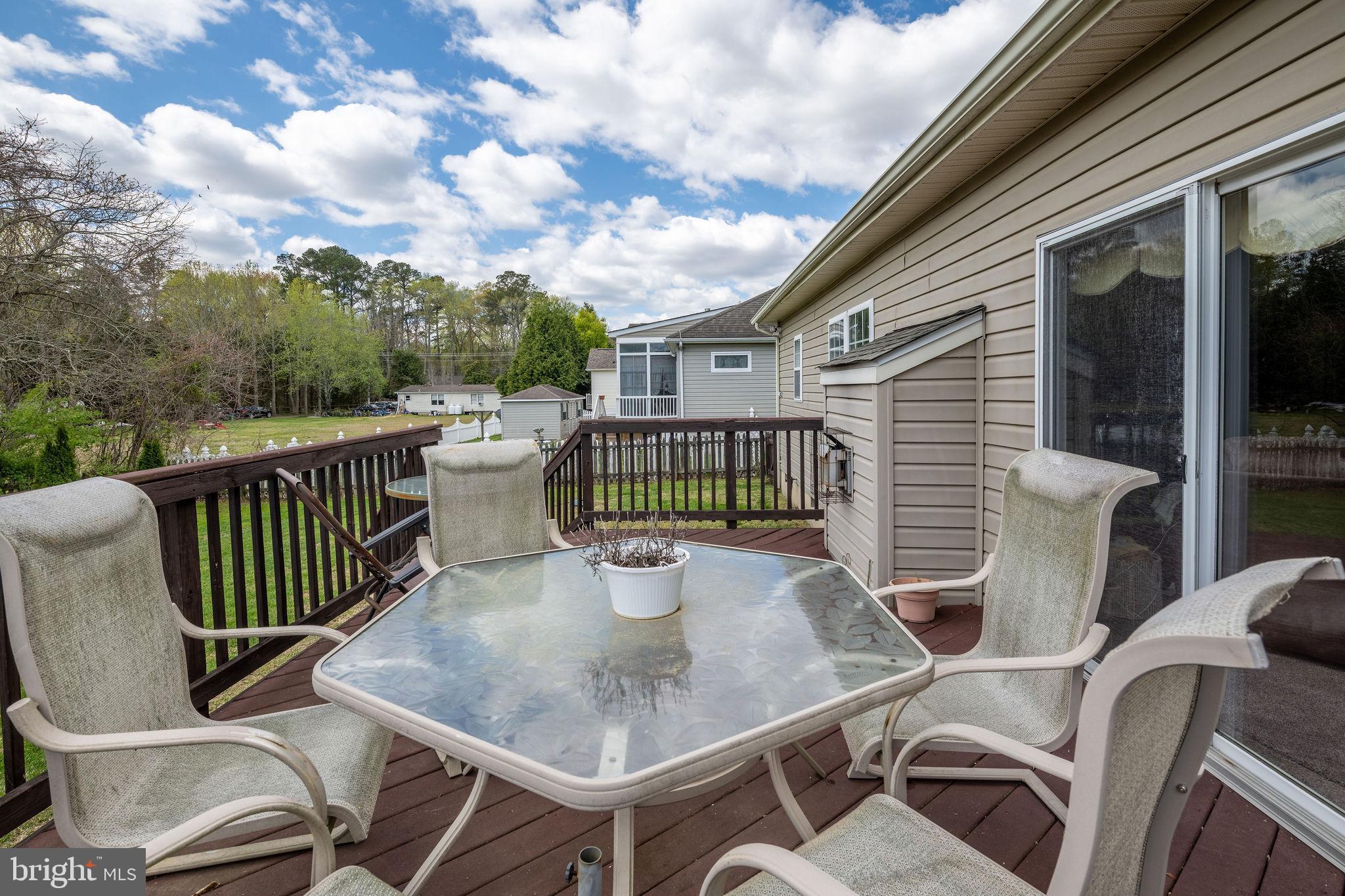 10 Arrowood Knobs Lewes, DE 19958 - Photo 29 of 40 a view of a chairs and table in the balcony