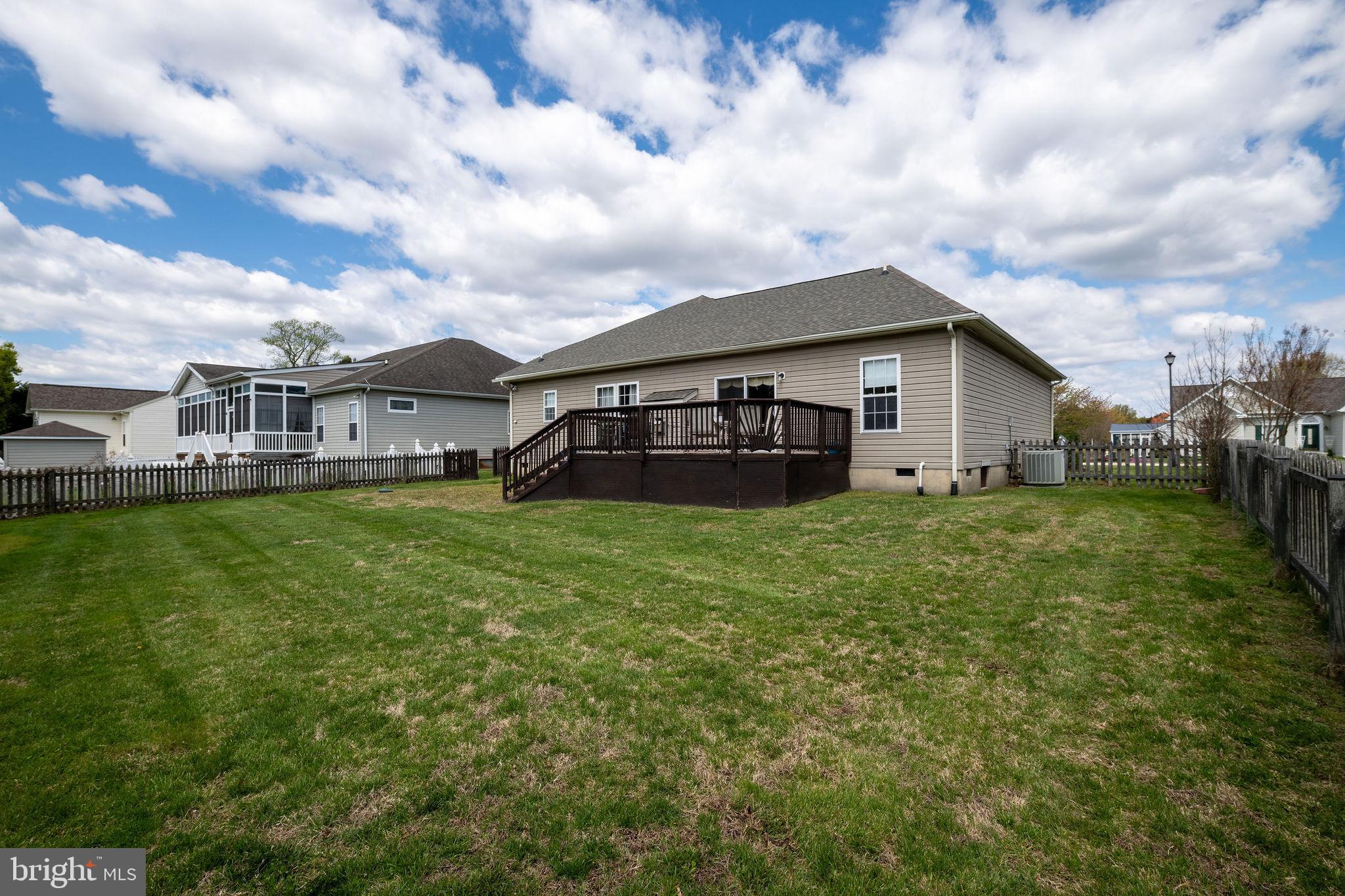 10 Arrowood Knobs Lewes, DE 19958 - Photo 34 of 40 a view of a house with a big yard and sitting area