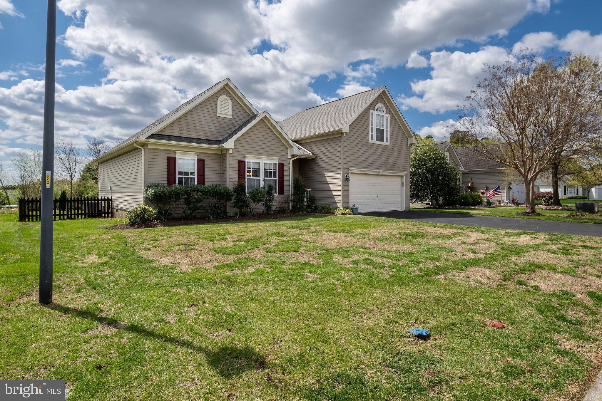 10 Arrowood Knobs Lewes, DE 19958 - Photo 36 of 40 a front view of house with yard and green space