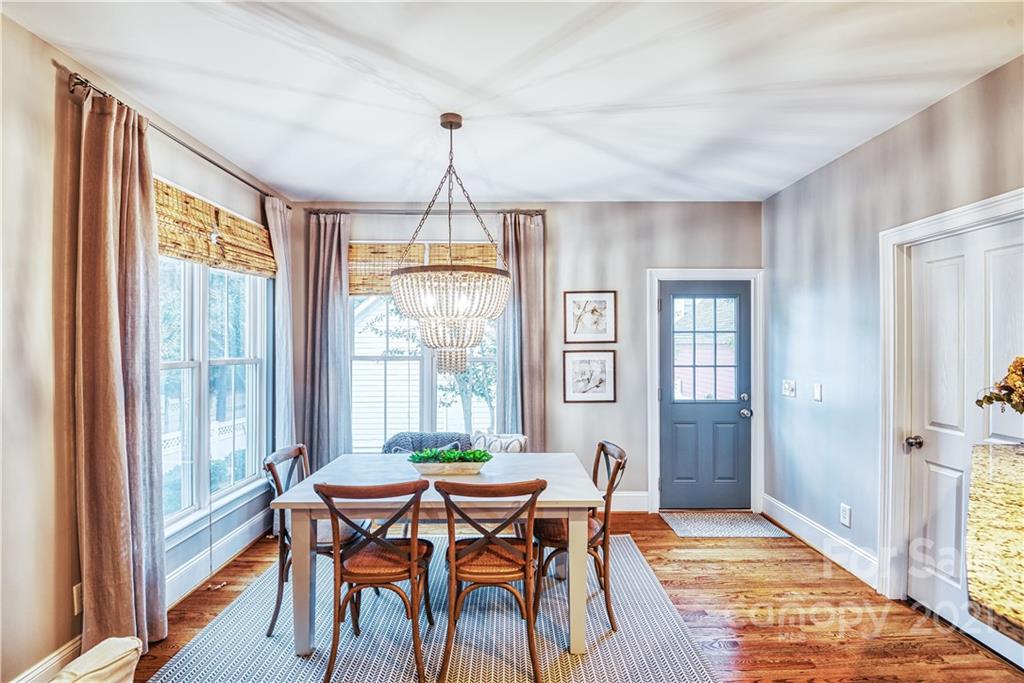 1183 Springmaid Avenue Fort Mill, SC 29708 - Photo 5 of 31 a view of a dining room with furniture window and wooden floor