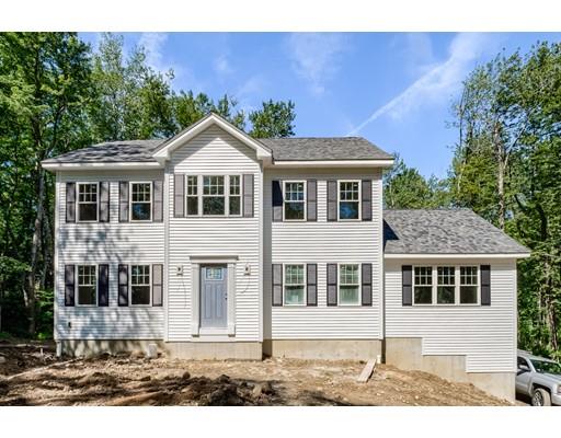 101 Glenwood Road Rutland, MA 01543 - Photo 1 of 23 a front view of a house with a garden