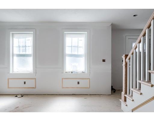 101 Glenwood Road Rutland, MA 01543 - Photo 11 of 23 a living room with a window and dresser