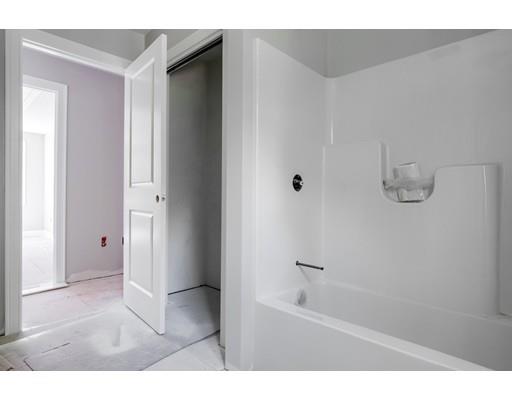 101 Glenwood Road Rutland, MA 01543 - Photo 21 of 23 a bathroom with a bathtub and a shower
