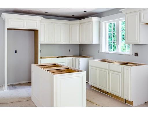 101 Glenwood Road Rutland, MA 01543 - Photo 4 of 23 a kitchen with cabinets appliances a sink and a window