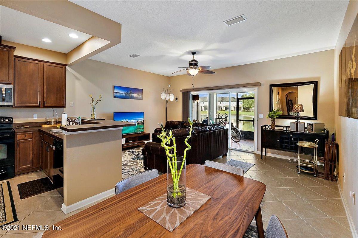 12944 Spring Rain Road Jacksonville, FL 32258 - Photo 5 of 19 05-Dining to Living Area