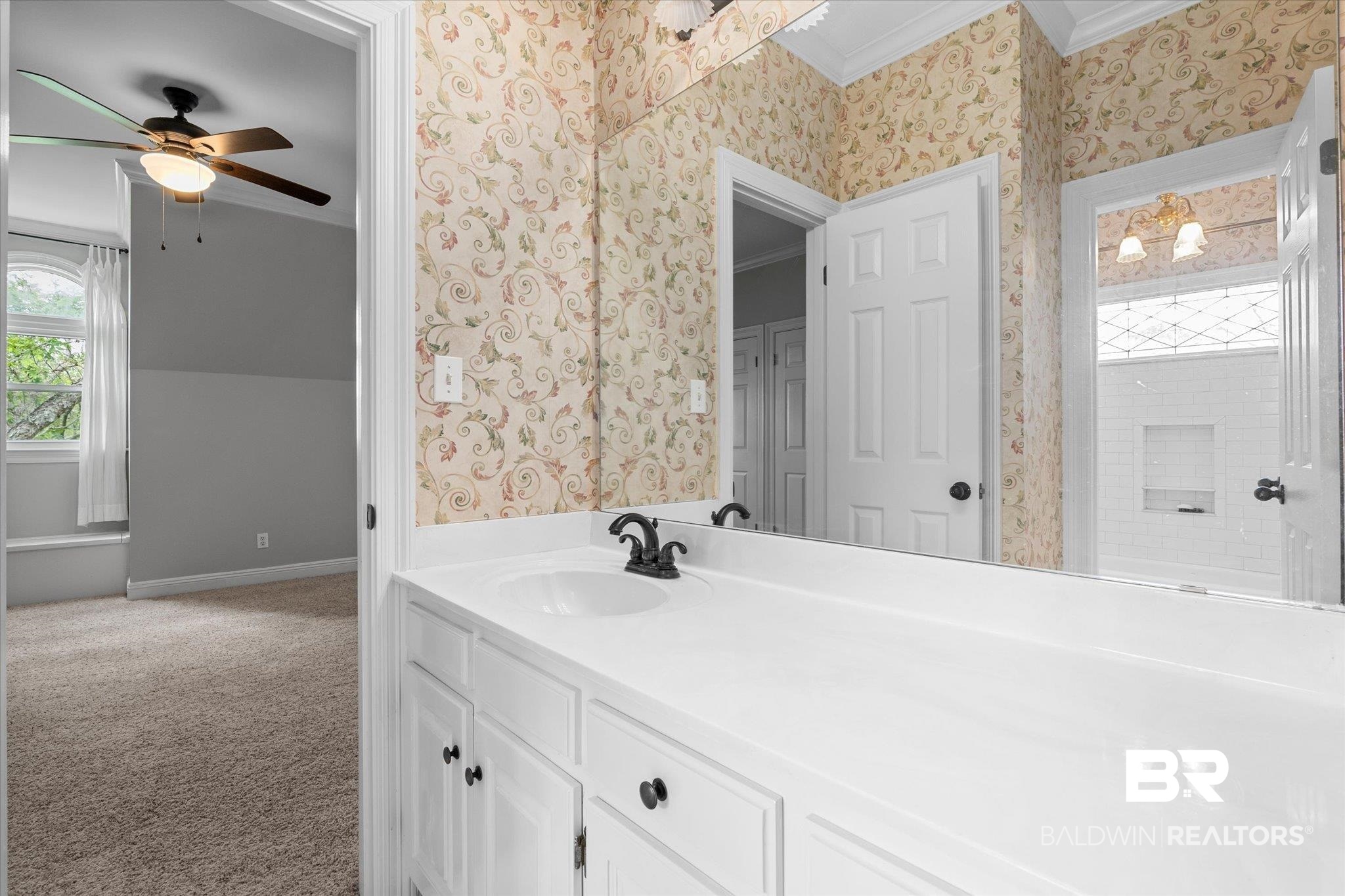 5231 Dawes Road Grand Bay, AL 36541 - Photo 20 of 49 Bathroom with ceiling fan, vanity, and ornamental molding