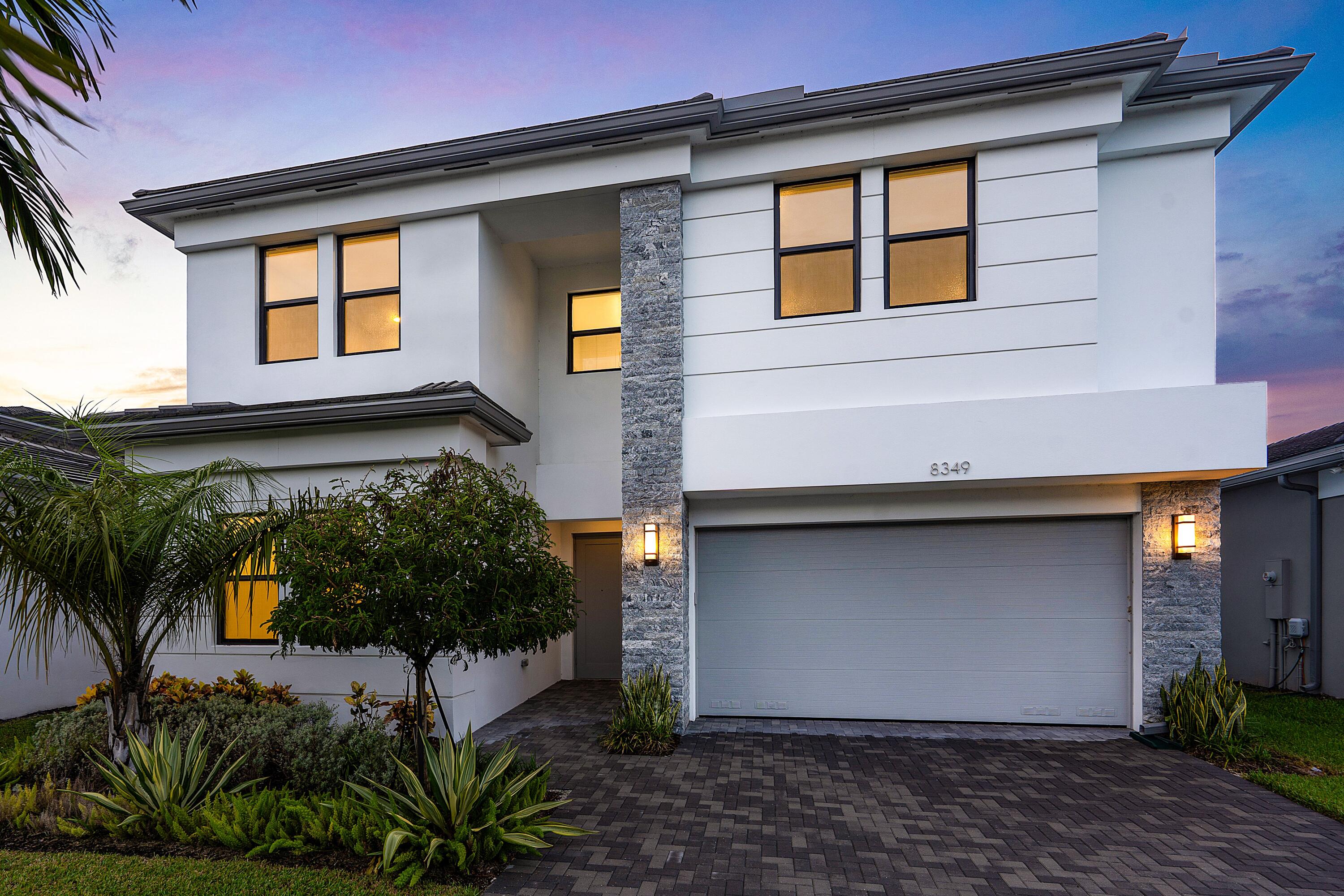 8349 Royal County Down Road Boca Raton, FL 33434 - Photo 3 of 40 8349 Royal Twilight Side Cropped