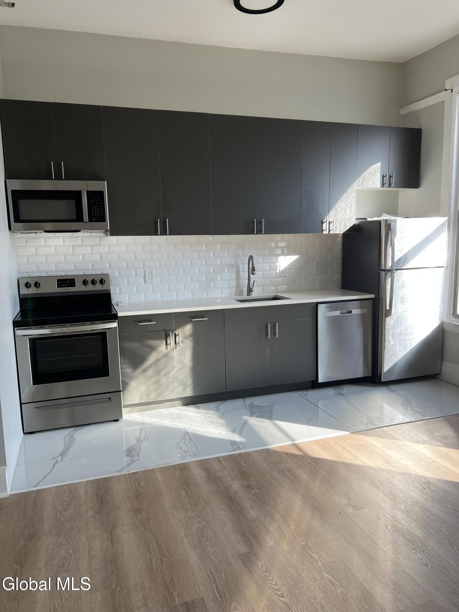 5 Broadway, Unit 308 Troy, NY 12180 - Photo 5 of 8 IMG_2190