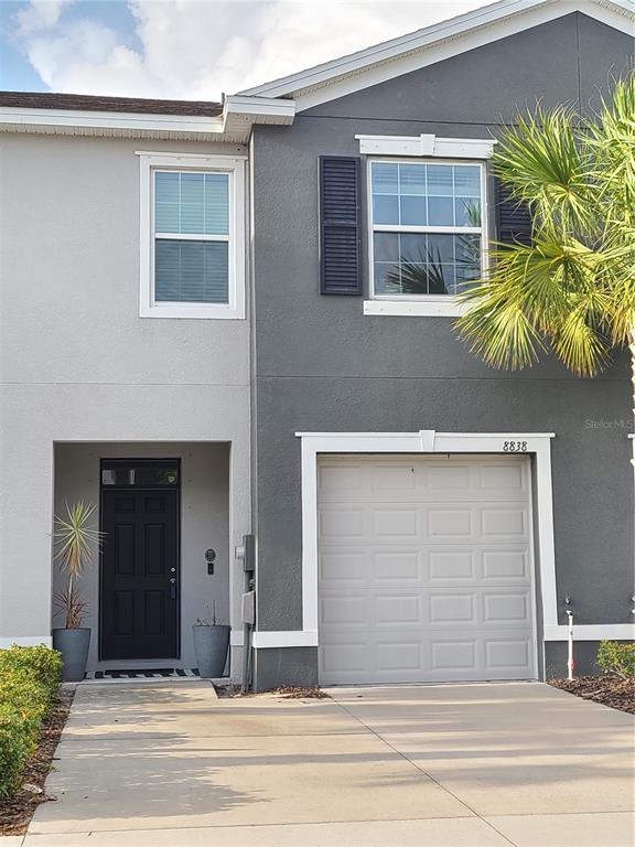 8838 Indigo Trail Loop Riverview, FL 33578 - Photo 1 of 1 a view of a house with a window and a potted plant