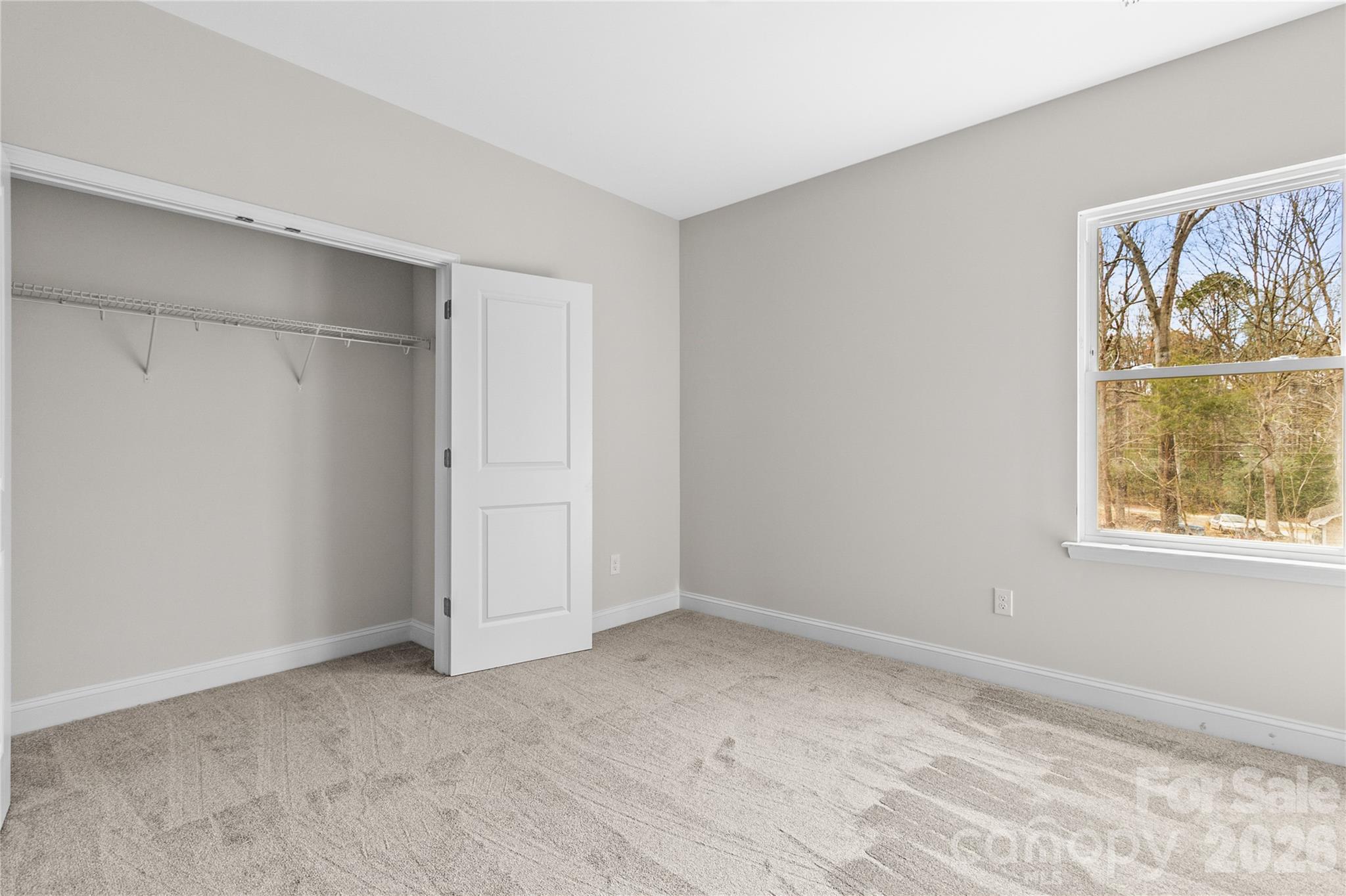 3692 Shannon Loop Denver, NC 28037 - Photo 35 of 47 a view of room with window and wooden floor