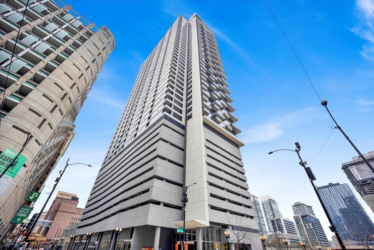 235 West Van Buren Street, Unit 4113 Chicago, IL 60607 - Photo 1 of 1 a view of a city with tall buildings