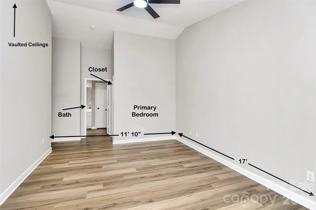 a kitchen with granite countertop a sink and a stove top oven