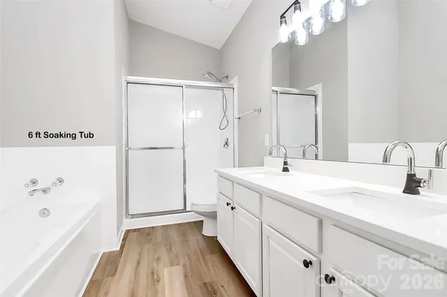 a view of a wooden fence