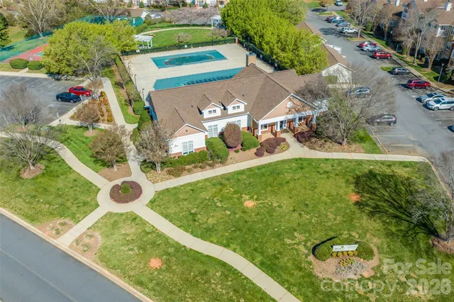 a kitchen with stainless steel appliances a stove refrigerator sink and microwave