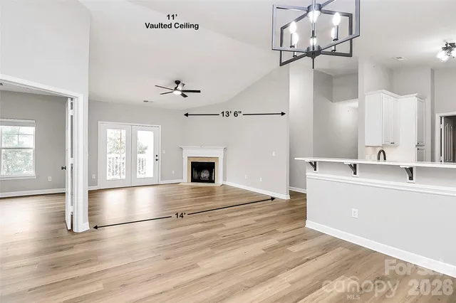a kitchen with a sink stove and microwave