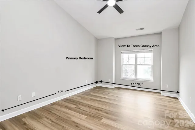 a kitchen with a refrigerator stove and microwave