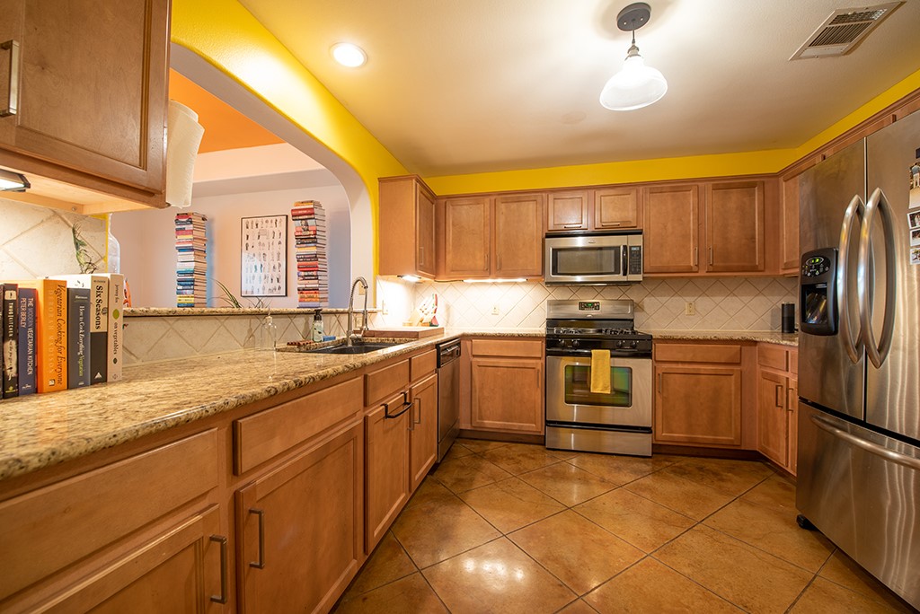 3609 Clawson Road, Unit A Austin, TX 78704 - Photo 3 of 17 Functional kitchen with ample cabinetry and robust appliances for daily use.