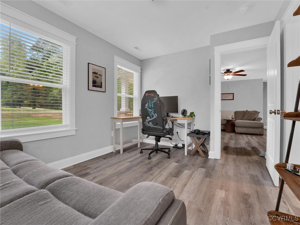 5440 New Line Road Gum Spring, VA 23065 - Photo 19 of 28 a workspace with furniture hardwood and a window