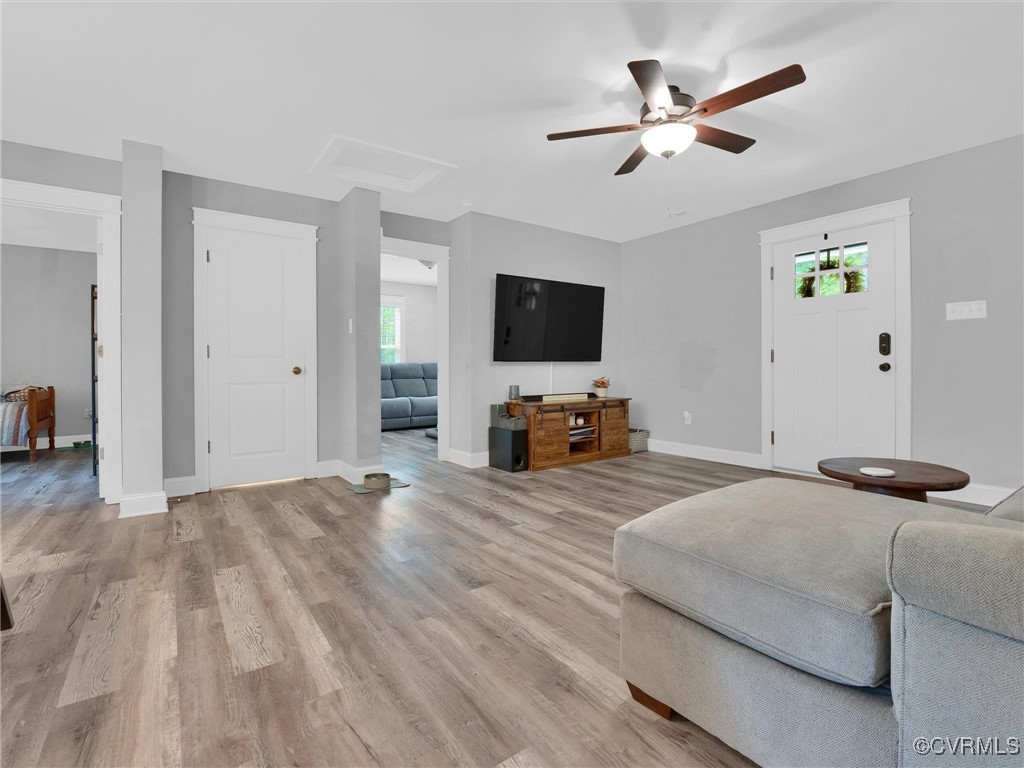 5440 New Line Road Gum Spring, VA 23065 - Photo 5 of 28 a bedroom with a bed window and a flat screen tv