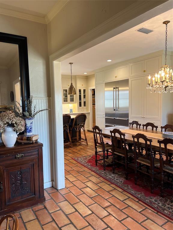 10200 North County Road Frisco, TX 75033 - Photo 13 of 25 a living room with furniture a dining table and a fireplace