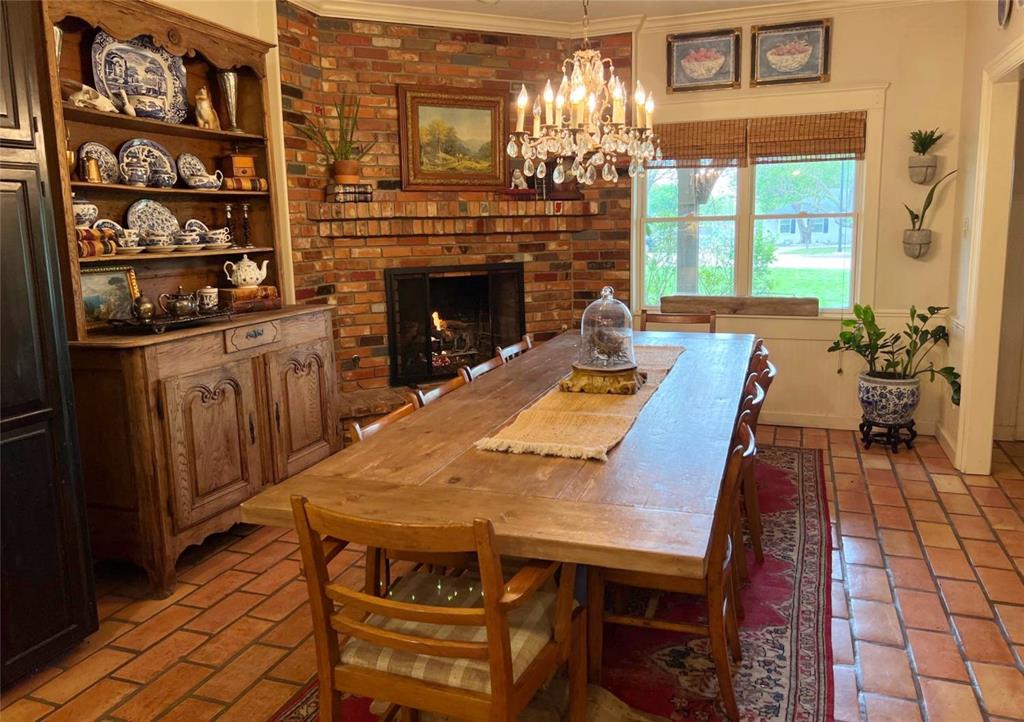 10200 North County Road Frisco, TX 75033 - Photo 14 of 25 a view of a dining room with furniture window and wooden floor