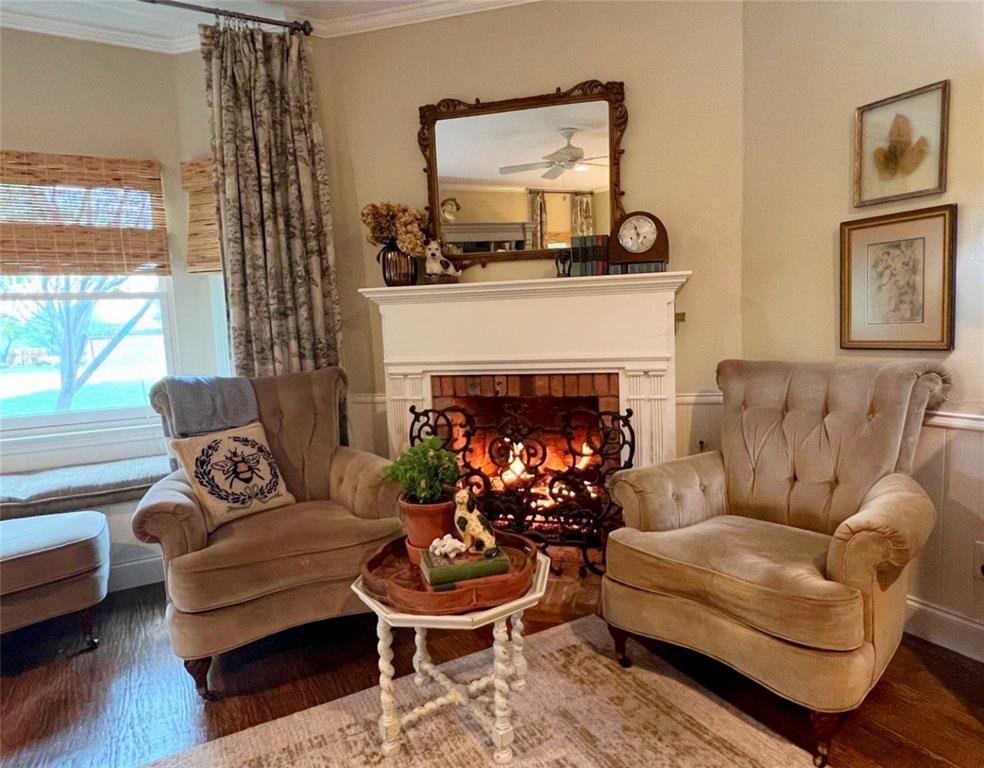 10200 North County Road Frisco, TX 75033 - Photo 17 of 25 a living room with furniture and a fireplace