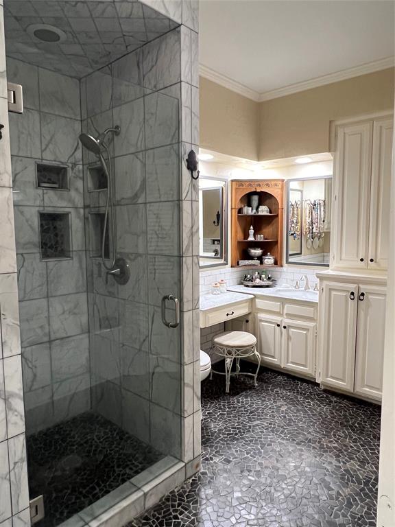 10200 North County Road Frisco, TX 75033 - Photo 20 of 25 a bathroom with a sink toilet and shower