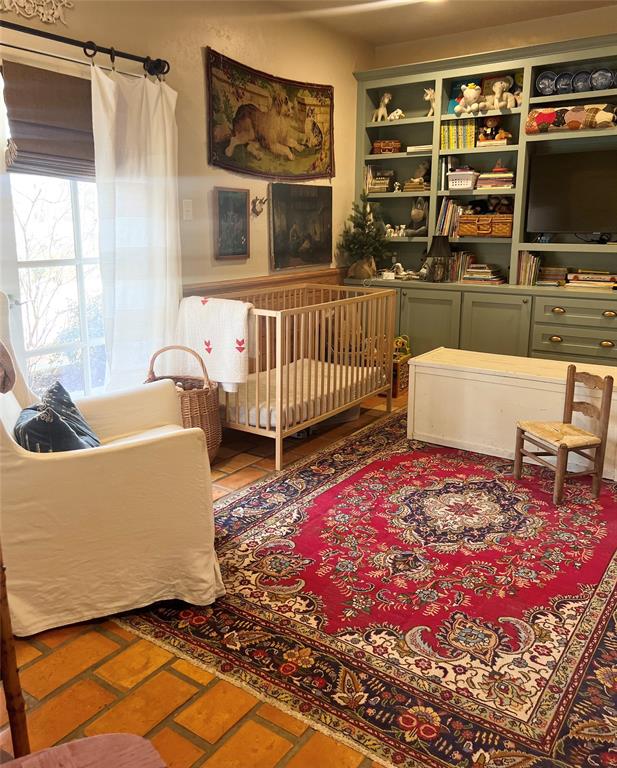 10200 North County Road Frisco, TX 75033 - Photo 23 of 25 a living room with furniture and a flat screen tv