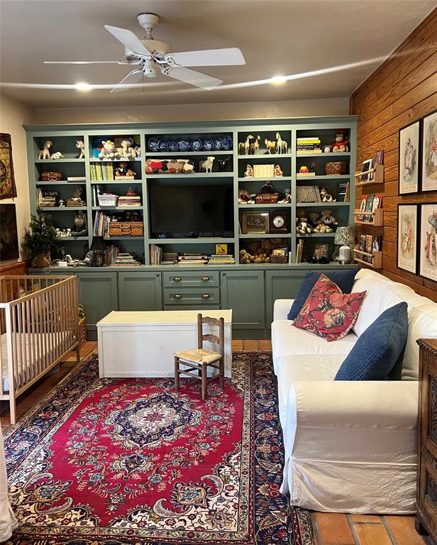 10200 North County Road Frisco, TX 75033 - Photo 24 of 25 a living room with furniture and a flat screen tv
