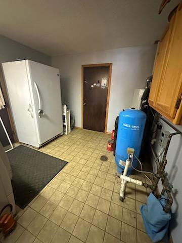 5820 South Skare Road Rochelle, IL 61068 - Photo 14 of 15 a bedroom with a bed and cabinets