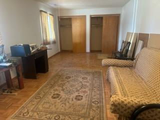 5820 South Skare Road Rochelle, IL 61068 - Photo 6 of 15 a living room with furniture and a flat screen tv