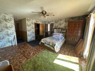 5820 South Skare Road Rochelle, IL 61068 - Photo 7 of 15 a bedroom with a large bed and a window