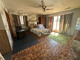 5820 South Skare Road Rochelle, IL 61068 - Photo 8 of 15 a bed sitting in a room next to a window