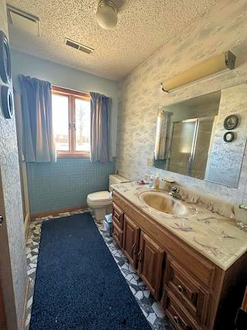 5820 South Skare Road Rochelle, IL 61068 - Photo 9 of 15 a bathroom with a granite countertop sink and a mirror