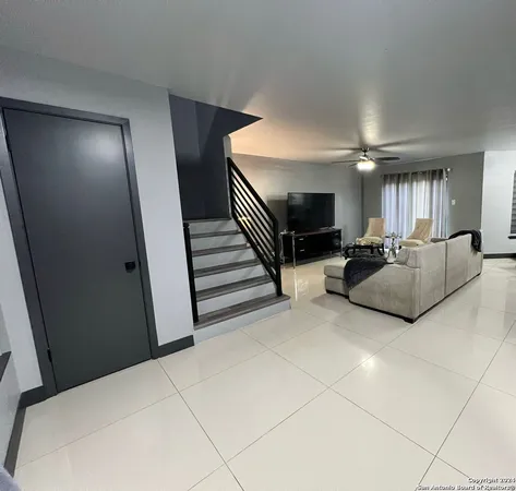 a kitchen with a sink stainless steel appliances and cabinets
